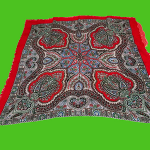 Ladies bright red patterned scarf. Measures 24x23. Fringed edges